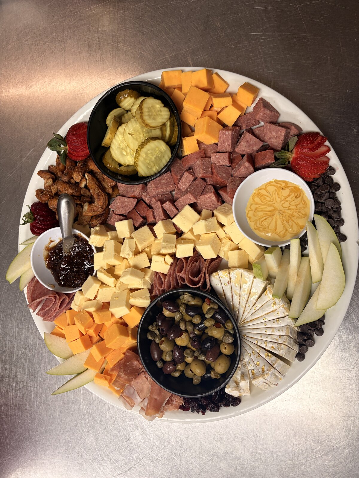 Cheese, olive and fig pairing plate